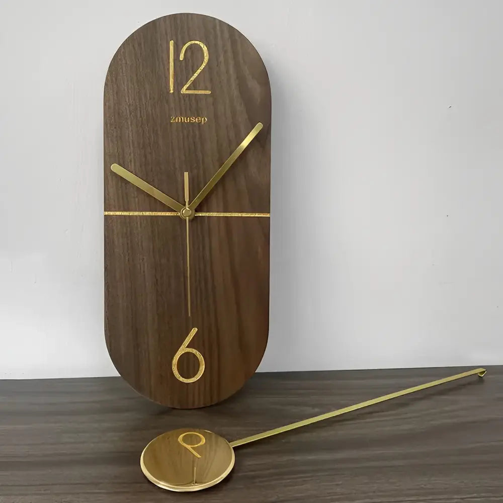 Orologio a pendolo Linea in noce e oro