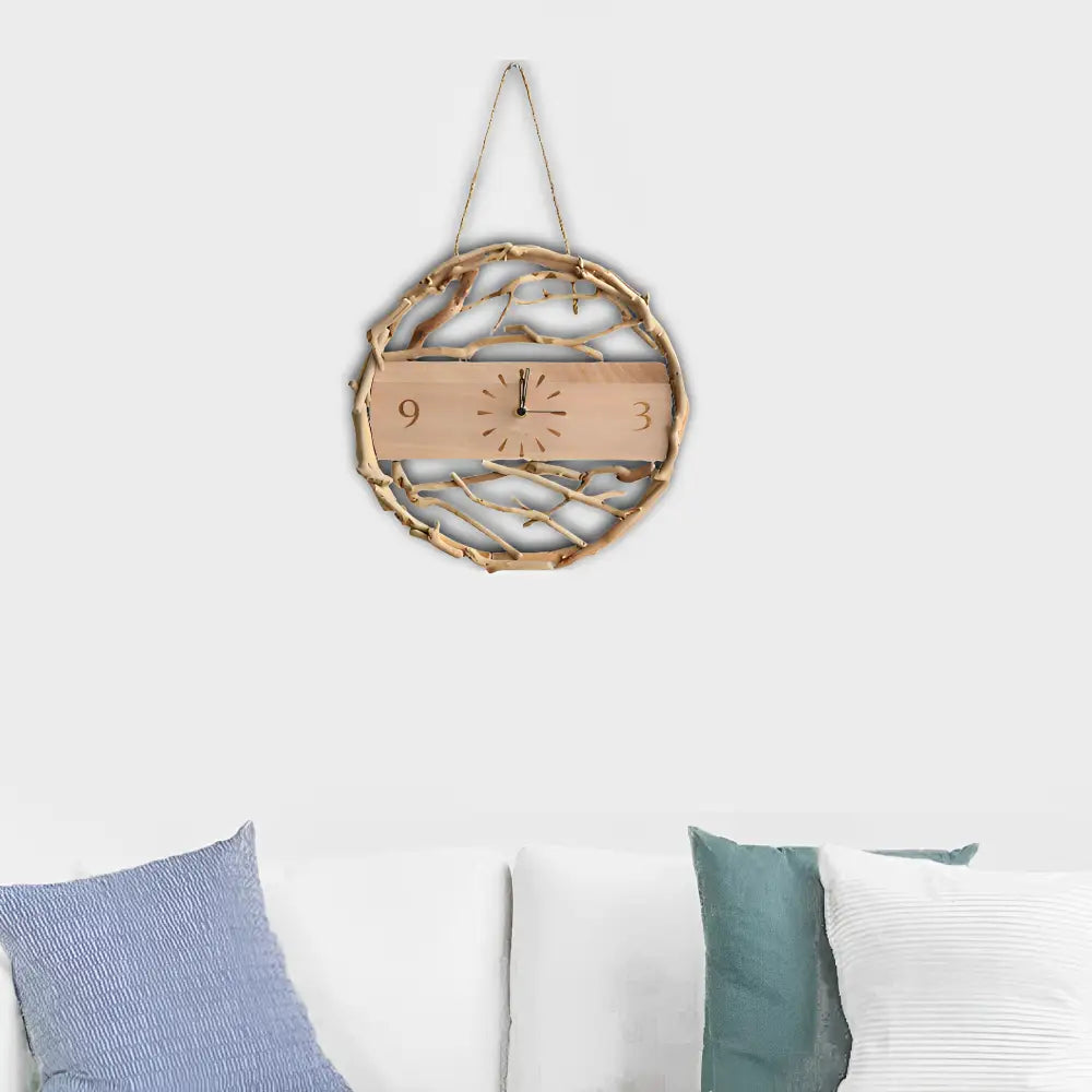 Orologio da parete con rami naturali