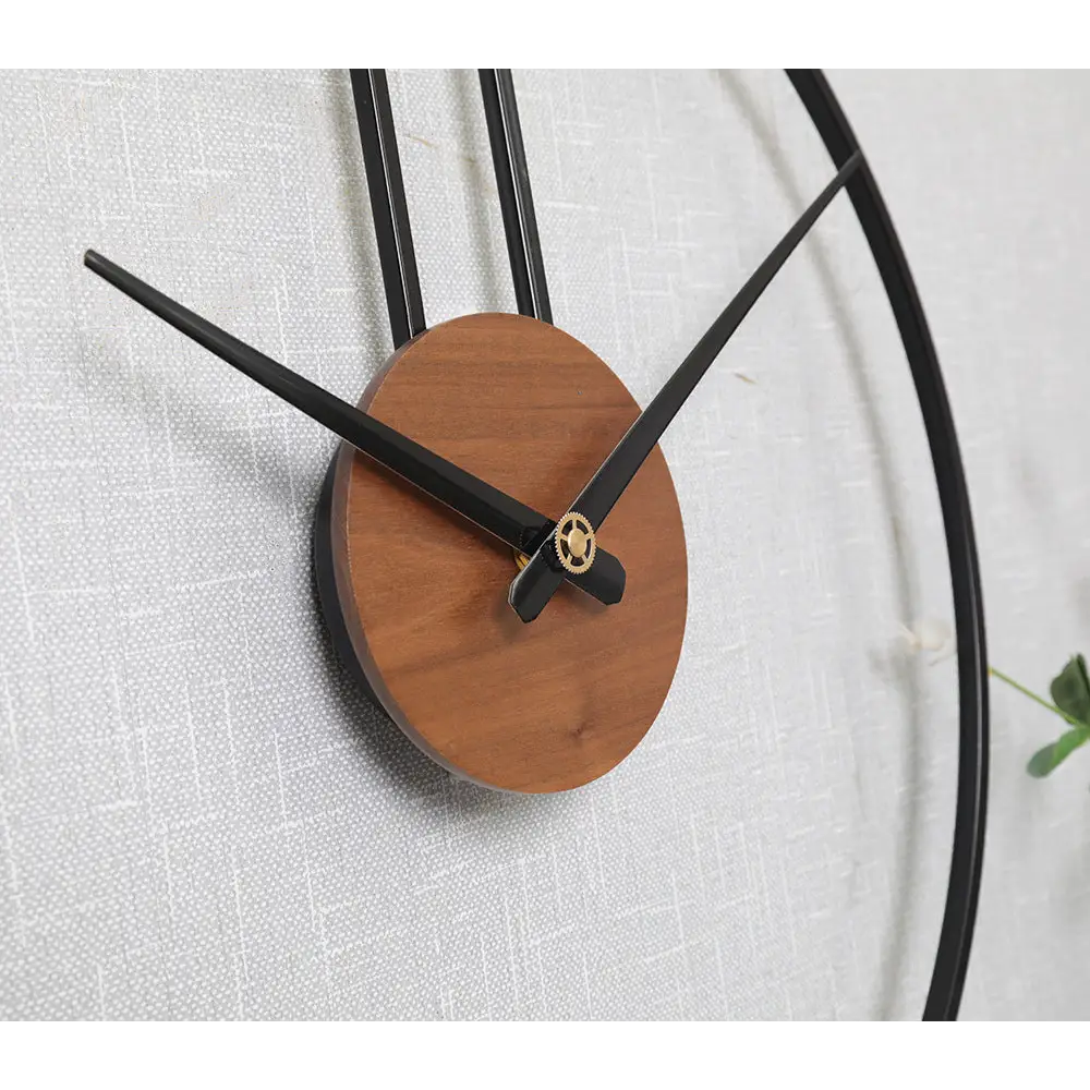 orologio da parete a forma di cerchio sospeso
